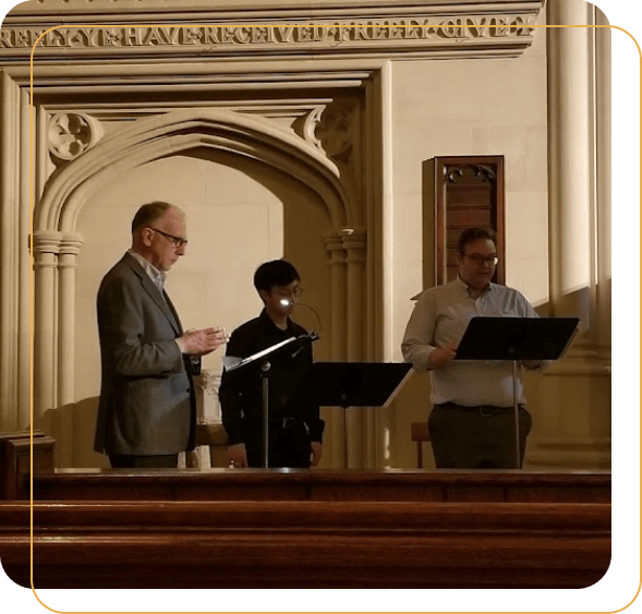 schola choir singing in a church